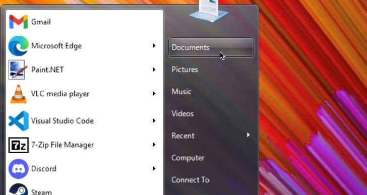 ViStart's Windows 7-style start menu showing Gmail, Microsoft Edge, Paint.NET, VLC, Visual Studio Code, 7-Zip, Discord and Steam, each with its own icon, with the wallpaper visible through the glass.