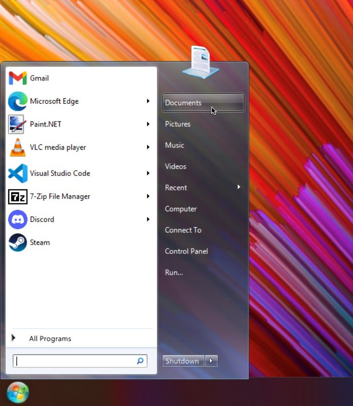 ViStart's Windows 7-style start menu on a modern Windows desktop, listing Gmail, Microsoft Edge, Paint.NET, VLC media player, Visual Studio Code, 7-Zip, Discord and Steam, with Aero glass showing the wallpaper through it.